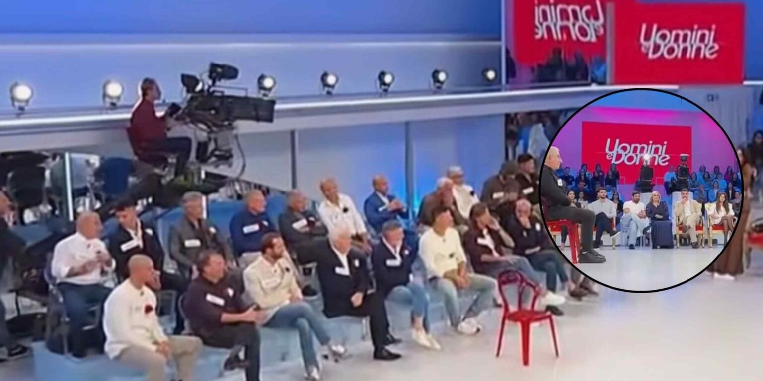 Valigia e sedile di treno in viaggio verso Roma per le registrazioni di Uomini e Donne